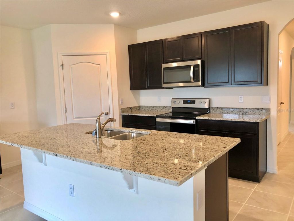 Photo of 1980 Chickasaw Boulevard, Davenport, FL 33837 (MLS # O6371546)