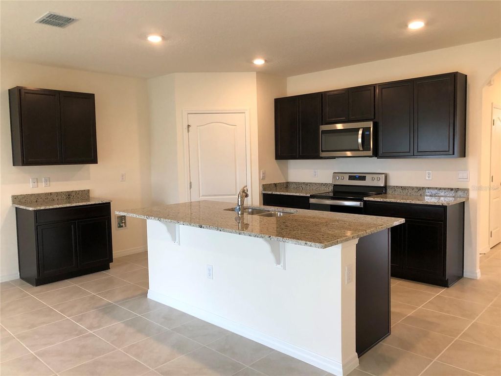 Photo of 1980 Chickasaw Boulevard, Davenport, FL 33837 (MLS # O6371546)