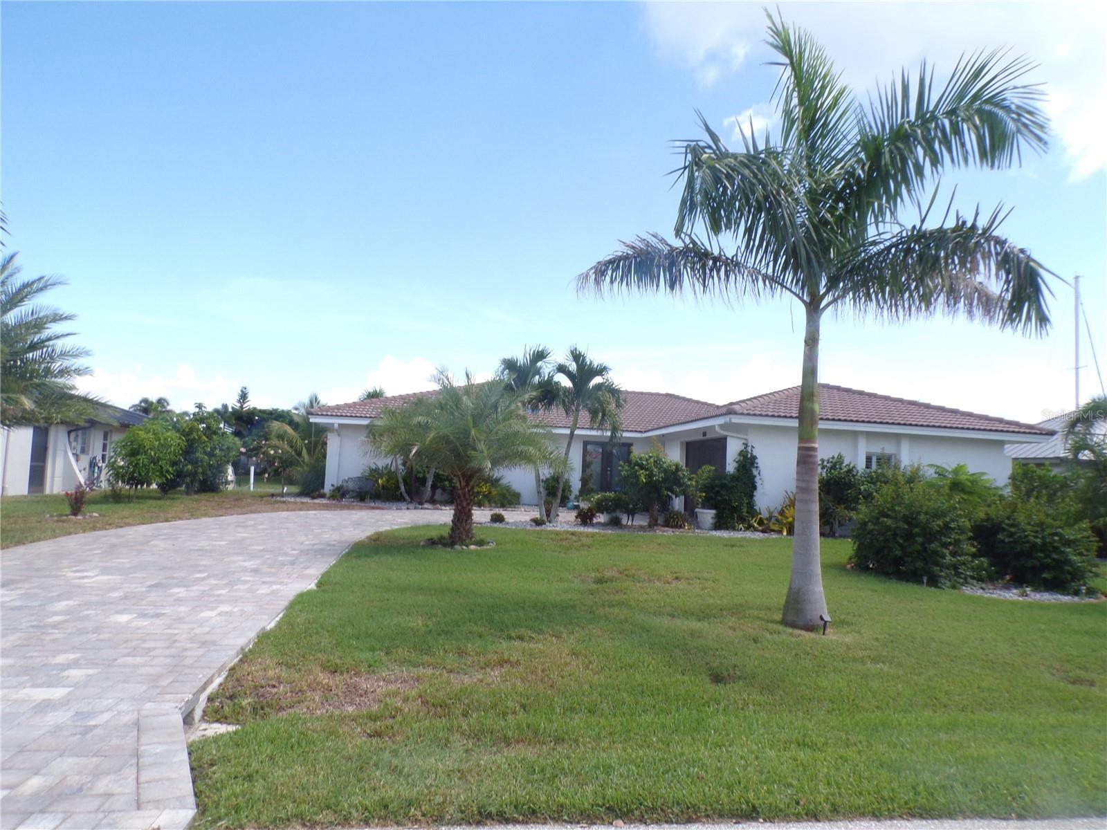 STUNNING SEASONAL RENTAL Located in the Highly Desirable community of Punta Gorda Isles; this WATERFRONT HOME offers access to Charlotte Harbor and the Gulf of Mexico. Enjoy boating in Charlotte Harbor and its waterways or visiting the charming Fishermen’s Village with restaurants, shops, downtown Punta Gorda, and the Historical District all within walking and biking distance. This 3 bedroom, 2 Bath, features a large Living Room/Great Room with beautiful water views from the air-conditioned Florida Room. Gorgeous kitchen and dining areas also feature water views and impeccable taste of decor. You and your family will appreciate the split bedroom floor plan with large master suite with Walk-In Closet, spacious bathroom vanity and walk-in shower, a nice sized 2nd and 3rd bedroom - both with Queen beds, and the 2nd bath with impressive, tiled stand up shower.