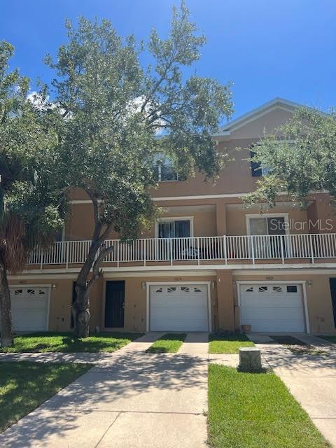 Stunning newly remodeled 3-bedroom, 2.5-bath townhome in desirable South Tampa! Freshly painted neutral colors accentuate the bright, open-concept floor plan which boasts a spacious living area and an oversized relaxing private balcony. The kitchen has been upgraded with pristine white cabinetry, quartz countertops, a large center island, and abundant storage. The extended bar, eat-in kitchen counter and large dining room are perfect for entertaining. An additional half bath and laundry room are also conveniently located on the main floor. Upstairs you'll find a massive and luxurious primary suite featuring a generous walk-in closet and a tastefully designed bathroom with dual sinks and frameless glass shower. Two additional bedrooms are located down the hall, flanking the guest bathroom. Rare oversized, extra-deep garage and driveway can fit 5+ vehicles including existing workshop benches, shelves and ample storage space. Prime location puts you just minutes from Bayshore, downtown, MacDill AFB, schools and St. Petersburg. A must-see!