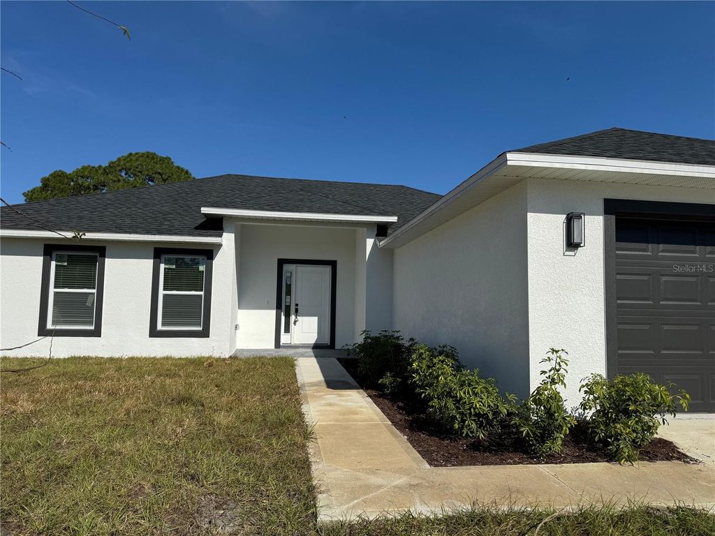 Photo of 1438 Seeley Circle NW, Palm Bay, FL 32907 (MLS # O6361966)