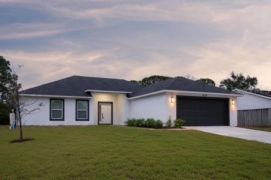 Photo of 1438 Seeley Circle NW, Palm Bay, FL 32907 (MLS # O6361966)