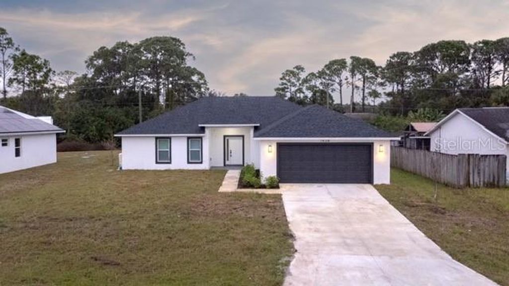 Photo of 1438 Seeley Circle NW, Palm Bay, FL 32907 (MLS # O6361966)