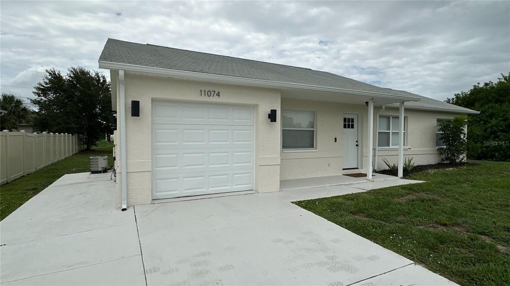 Photo of 11074 Carnegie Avenue, Englewood, FL 34224 (MLS # A4699299)