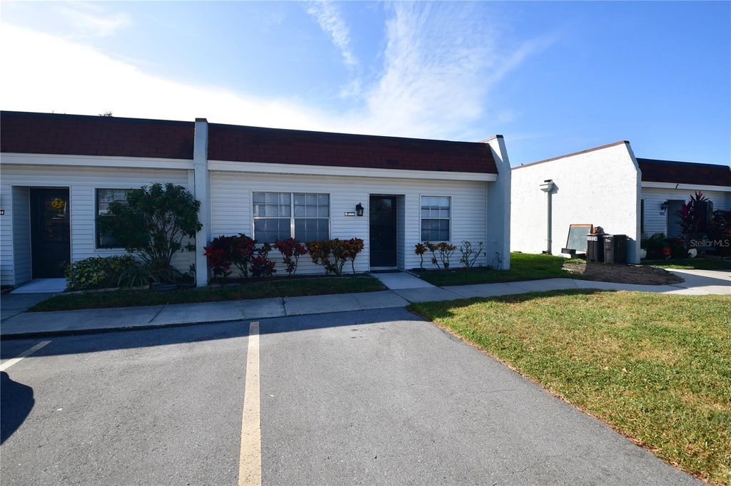 Photo of 13920 Mission Oaks Boulevard #13920, Seminole, FL 33776 (MLS # TB8441370)