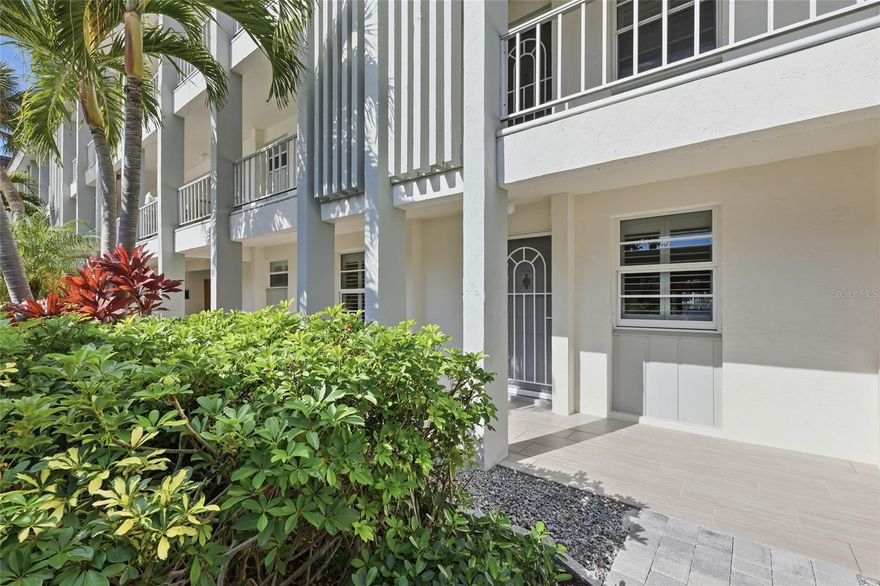 Experience the timeless appeal of Longboat Harbour in this beautifully updated first-floor residence, where refined coastal living meets comfort and convenience. Ideally just near deeded beach access, this rare offering provides walkout access to a manicured lawn with tranquil water views, creating a villa-like ambiance. Finely appointed updates include tile flooring throughout, Frigidaire appliances, a 2.5-year-old air-conditioning system, plantation shutters, automated blinds and turnkey furnishings featuring a West Elm leather couch, coastal end tables, coffee table, breakfast set and dining table with six chairs. Covered, assigned parking and ample guest spaces add ease. This gated, self-managed bayfront community offers kayak storage and launch, seasonal dock rentals, fitness center with group classes, tennis and pickleball, sauna, craft room, woodshop, library, game rooms and vibrant social events. No pets. Rentals are 30-day minimum, twice annually.