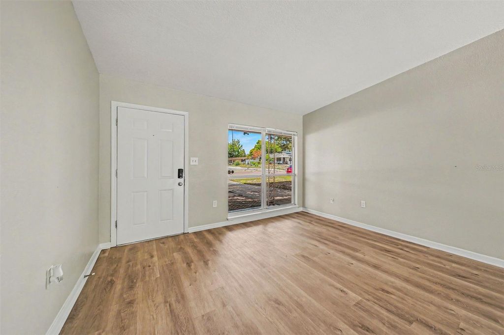 Photo of 5909 Wolf Road, Orlando, FL 32808 (MLS # O6408674)
