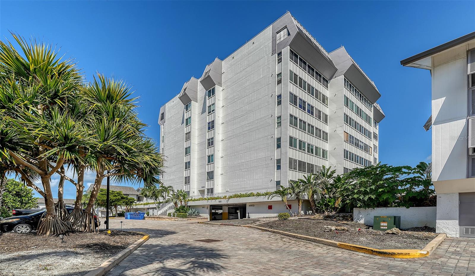 Welcome to Peppertree Bay, one of Siesta Key’s most coveted Gulf to Bay communities, where island living meets effortless elegance. This turnkey, beautifully reimagined 2 bedroom, 2 bathroom residence is nestled within the desirable midrise building on the beach side of the complex, offering the perfect combination of privacy, convenience, and resort style amenities. Just steps from Siesta Key’s world renowned quartz sand, this home embodies the island lifestyle.
From the moment you enter, you’ll be captivated by the peaceful view of the tranquil pond and fountain, setting the tone for relaxation. This updated unit has been thoughtfully redone, showcasing a spacious open concept floor plan that seamlessly blends form and function. The gourmet kitchen is a showstopper, featuring granite countertops, stainless steel appliances, soft close cabinetry, and a breakfast bar perfect for casual dining or entertaining. Elegant ceiling fans and updated fixtures enhance the coastal vibe, while the dining and living areas flow together effortlessly, creating a bright and inviting space for family gatherings or quiet evenings.
The primary suite is a serene retreat with a walk in closet and ensuite bath, and the guest bedroom provides a comfortable haven for visitors. With a strong rental history, this property is as appealing to investors as it is to those seeking a full time residence or seasonal escape.
At Peppertree Bay, residents enjoy private deeded beach access, two heated swimming pools, tennis courts, a fitness center, clubhouse, fishing pier, and professional onsite management. Covered parking and extra storage add convenience to this lock and leave lifestyle.
Situated close to Siesta Key Village, eclectic dining, boutique shopping, and vibrant cultural experiences, this home truly offers it all. Whether you are looking for an income producing investment, a sun soaked seasonal retreat, or a luxurious full time residence, this residence at Peppertree Bay delivers the very best of Siesta Key living.