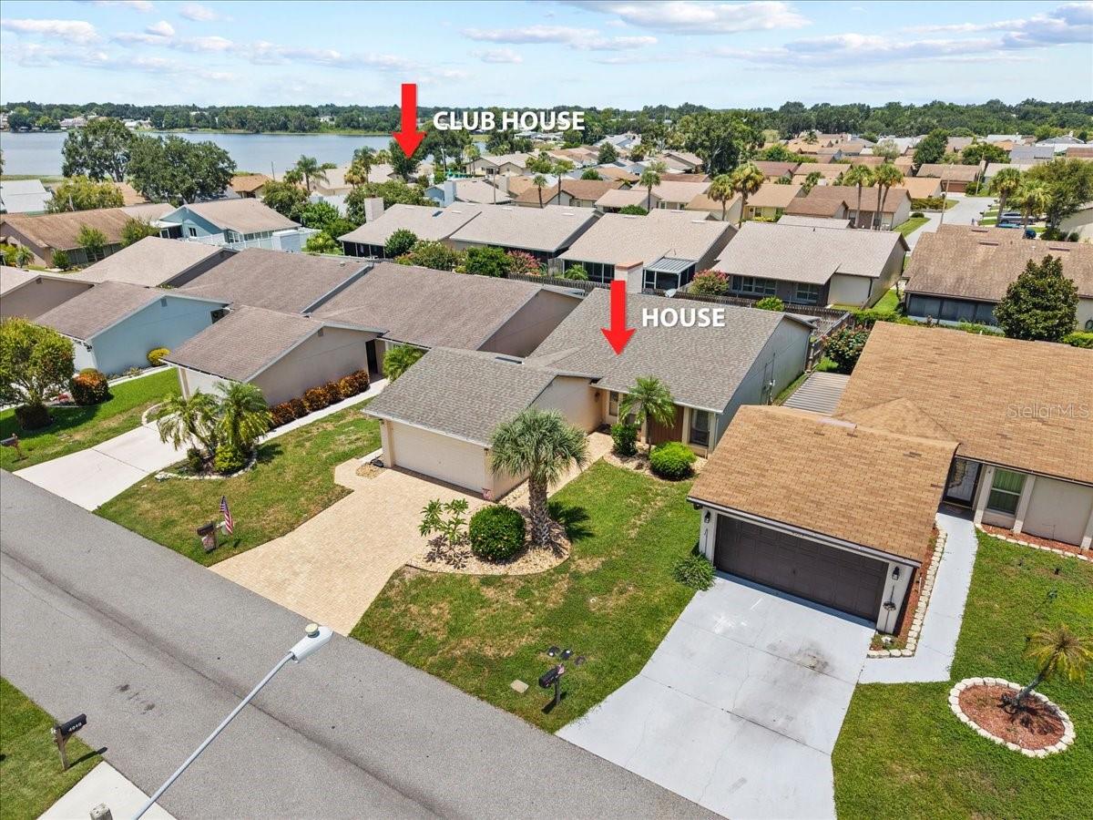 Welcome to your beautiful new home in the highly sought-after community of Cypress Landings! This charming 2-bedroom, 2-bathroom residence features an open-concept layout with split bedrooms, offering both comfort and privacy. The living room is bright and airy, with sliding glass doors that lead to a fully enclosed patio—complete with a mini-split system for year-round enjoyment. It’s the perfect space to sip your morning coffee or unwind in the evening while overlooking your private fenced backyard. The spacious eat-in kitchen offers plenty of wood cabinetry, a pantry, and large windows that bring in natural light. Just outside, a cozy brick patio provides the perfect spot for grilling or relaxing. The primary suite is a true retreat, with direct access to the enclosed patio and an en suite bath featuring , a walk-in closet, a tiled walk-in shower and single vanity. A second bedroom and full bath with a tub provide a comfortable space for guests. Additional features include ceramic tile, laminate , and carpet flooring, vaulted ceilings, a dining area, and an indoor laundry room with built-in storage, washer, and dryer. Outside, you'll find a paved entryway and driveway, a 2-car garage, rain gutters, and a full irrigation system. Major updates include a new roof (2022) and a new AC unit (2023). Cypress Landing offers an unbeatable lakefront lifestyle with incredible amenities! Residents enjoy planned community activities, a heated pool, clubhouse, tennis and pickleball courts, a fishing pier on Lake Dexter, a private boat ramp, boat parking, a peaceful gazebo, and so much more. Whether you love boating, social events, or simply relaxing by the water, Cypress Landing has something for everyone! Conveniently located near shopping, dining, medical facilities, and Legoland—this home has everything you need and more!