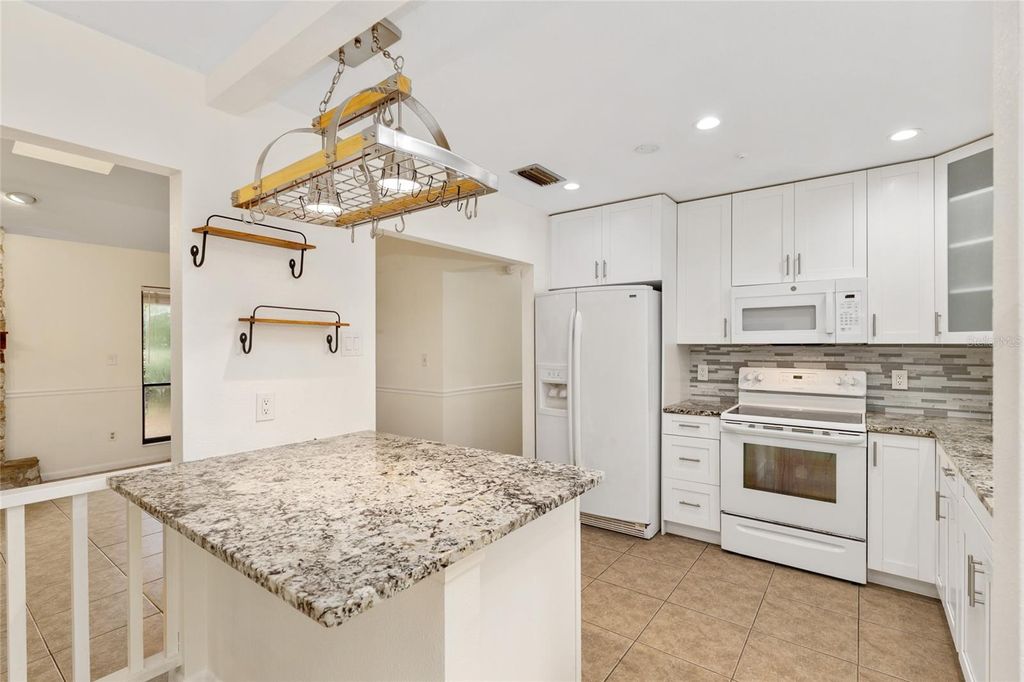 Photo of 8129 SW 57th Place, Gainesville, FL 32608 (MLS # GC536304)