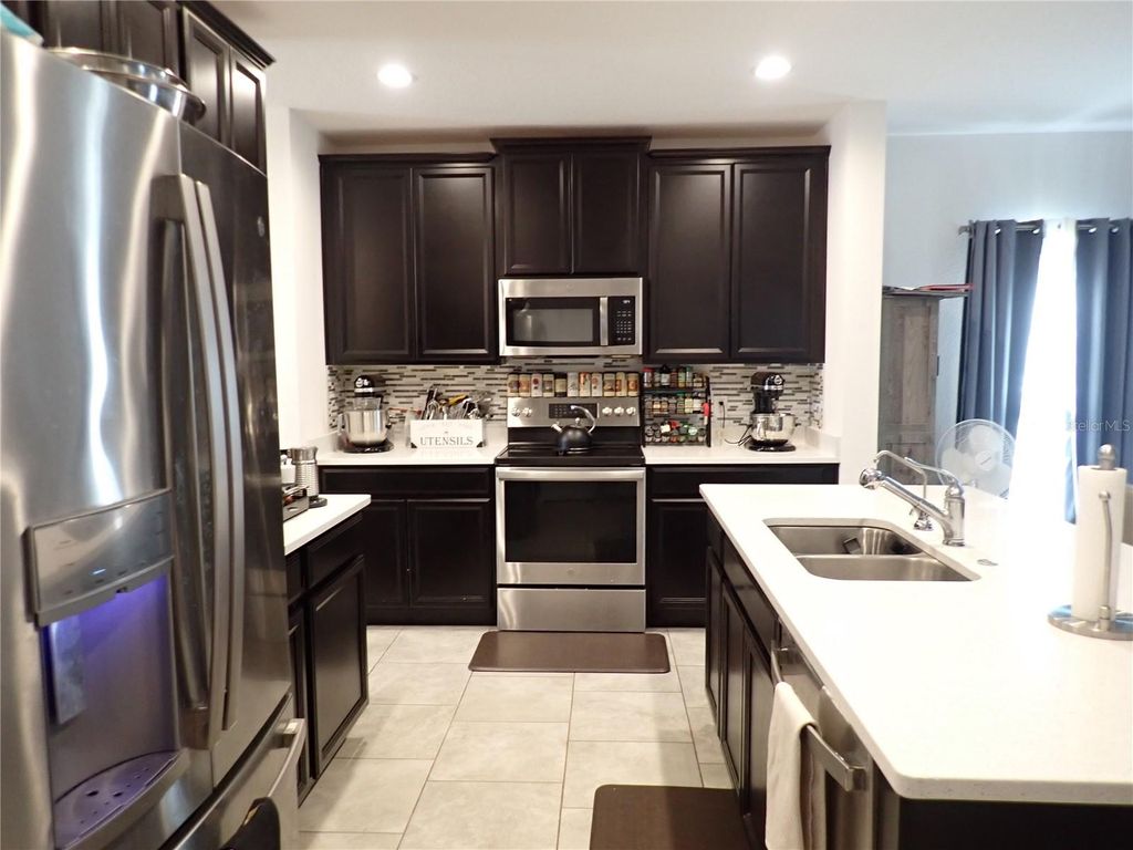 Photo of 508 Wildcat Ln, Davenport, FL 33837 (MLS # TB8486140)