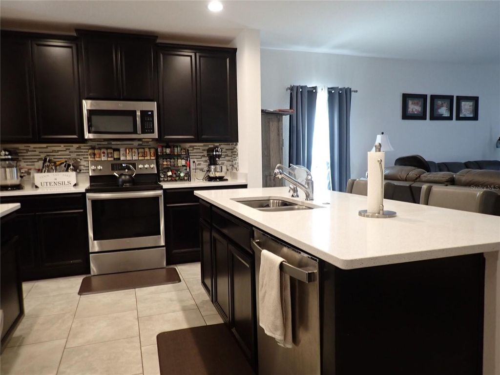 Photo of 508 Wildcat Ln, Davenport, FL 33837 (MLS # TB8486140)