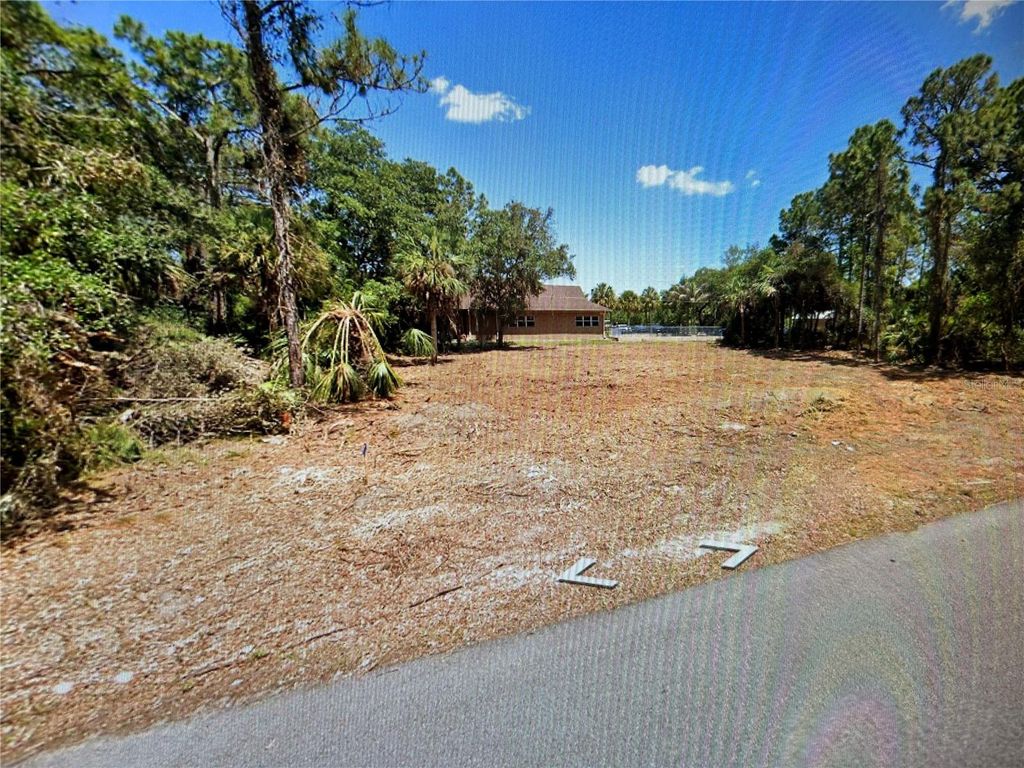 Photo of 1412 Lullaby Street, Port Charlotte, FL 33948 (MLS # T3527546)