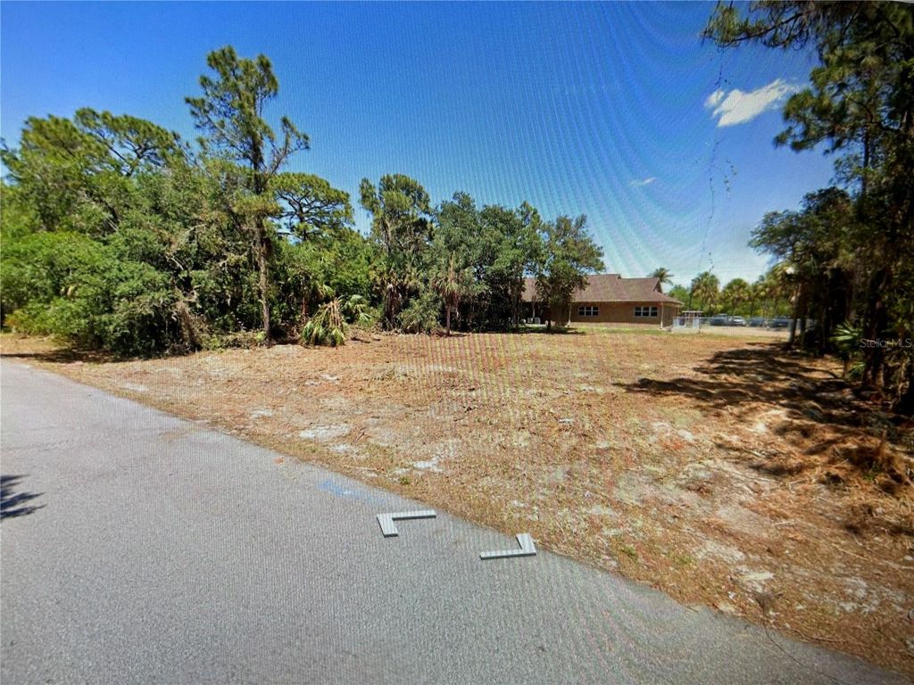 Photo of 1412 Lullaby Street, Port Charlotte, FL 33948 (MLS # T3527546)