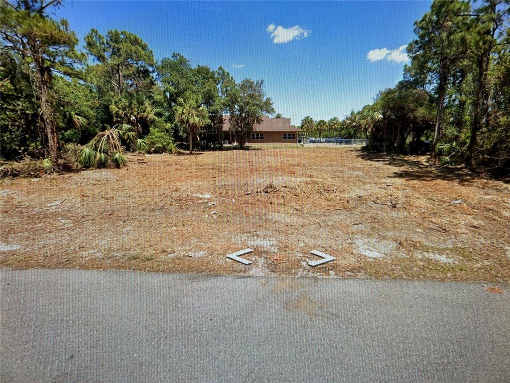 Photo of 1412 Lullaby Street, Port Charlotte, FL 33948 (MLS # T3527546)