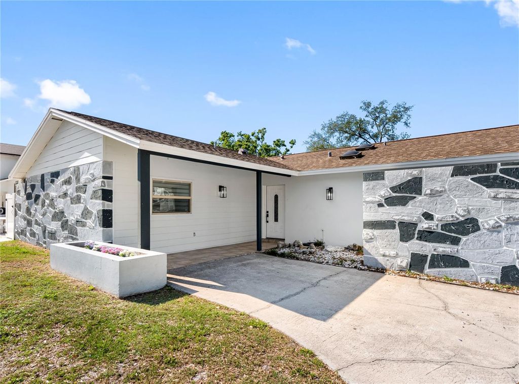 Photo of 7305 Woodkirk Court, Tampa, FL 33634 (MLS # TB8415375)