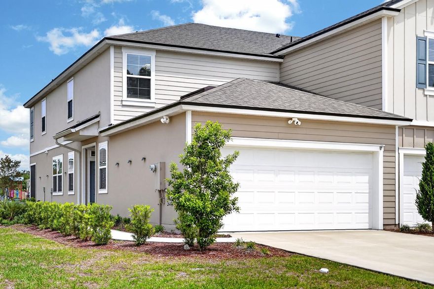 Fully upgraded 3-bedroom, 2.5-bath townhouse in the gated Trails community, offering modern finishes and a serene water view. This ~1,800 sq ft home stands out with luxury vinyl flooring throughout the entire second floor and staircase (no carpet) and completely renovated bathrooms featuring spa-style showers with dual rainfall systems, smart toilets, and LED-lit mirrors—rare upgrades at this price point. The open-concept layout flows into a private screened lanai overlooking a peaceful pond, creating an open and relaxing backdrop for everyday living. Additional updates include modern cabinet hardware throughout and a clean, move-in-ready interior. The low HOA covers lawn care and irrigation, providing a true low-maintenance lifestyle. Conveniently located just 11 miles from Flagler and Hammock Beach and within 30 minutes of St. Augustine and Daytona Beach.