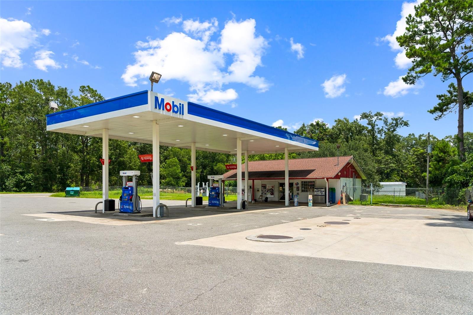 Exceptional Net-Leased Gas Station Investment | in Prime I-10 Corridor
Tenant is a multi-unit operator with a strong Mobile/Citgo brand.
High-Performing Local Operator: The tenant operates over 40 successful gas station and convenience store locations across Florida and Georgia. Known for outstanding operational standards, the group has a proven record of revenue growth, compliance, and customer satisfaction.
Long-Term NNN Lease: 17 years remaining on a 20-year absolute triple-net lease with zero landlord responsibilities.
Strong Passive Income: Current Net Operating Income (NOI) of $92,400 with $350 fixed annual increases, generating increasing cash flow over time.
Fully Renovated Facility: Recent improvements include new fuel pumps, LED canopy lighting, modernized convenience store interior. Improvements: New fuel dispensers,upgraded HVAC, ADA-compliant restrooms, POS system, modern interior shelving and refrigeration units, exterior security cameras, and updated landscaping.
Productive and Profitable Operation: High monthly sales volume for both fuel and retail convenience items. Popular with both locals and long-distance travelers.
National Branding: Mobil-branded fuel station with Mobile supply chain support. Professional signage and fuel canopy provide strong curb appeal.
High-Traffic Location: Located just off I-10 with daily traffic counts exceeding 15,000 vehicles. Prime positioning for both local and interstate service.
Future Upside: Fixed annual rent increases provide a reliable hedge and increasing investor returns over time.
Lease Type: Absolute Triple Net (NNN)
Lease Term Remaining: 17 Years
Annual Escalations: $350 fixed annual increase
Current NOI: $92,400
Building Size: Approx. 1876 sq. ft.
Lot Size: Approx. 1.00 acre
Parking: 8–10 surface spaces
Year Built: 1982 (Renovated)
Zoning: Commercial
LOCATION HIGHLIGHTS
Regional Access: Located directly off I-10, one of Florida’s major east-west interstates, with seamless ingress/egress from Pat Thomas Parkway.
Local Market: Quincy is the county seat of Gadsden County and forms part of the rapidly growing Tallahassee metropolitan statistical area.
Nearby Tenants: CVS, Family Dollar, Pizza Hut, fast food chains, hospitality providers, and local retail.
Traffic Count: Estimated 15,000+ vehicles a day; captures both local residents and transient highway traffic.
Population Growth: The Quincy-Tallahassee corridor continues to attract residential development and logistics traffic.
Essential Service: The station is a key fuel and retail stop for local commuters, long-haul drivers, and travelers on I-10. Strong daily foot traffic.