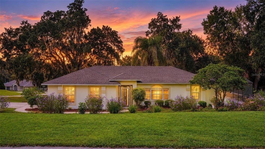 Photo of 211 Hanging Moss Lane, Lady Lake, FL 32159 (MLS # G5104571)
