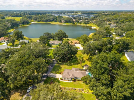 211 HANGING MOSS LN, LADY LAKE, FL 32159 - Image febe7e2e7702e4ea00b71e4f2a96c9ea/3968432493