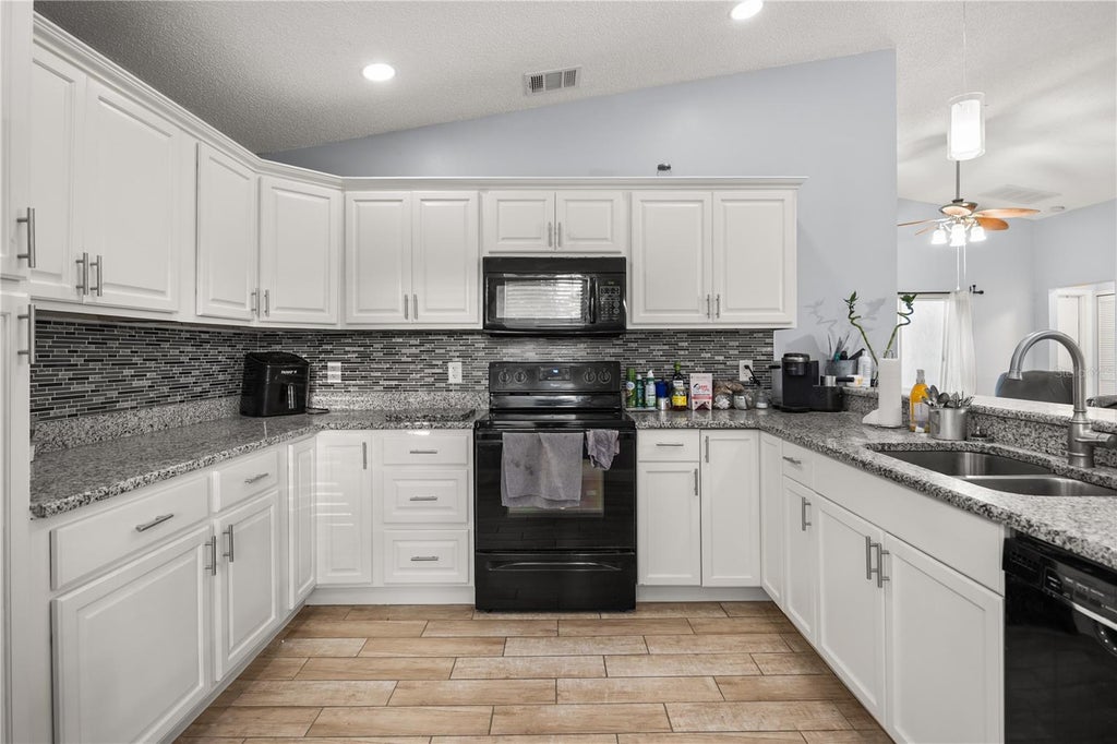 Photo of 2930 Woolridge Drive, Orlando, FL 32837 (MLS # O6449627)