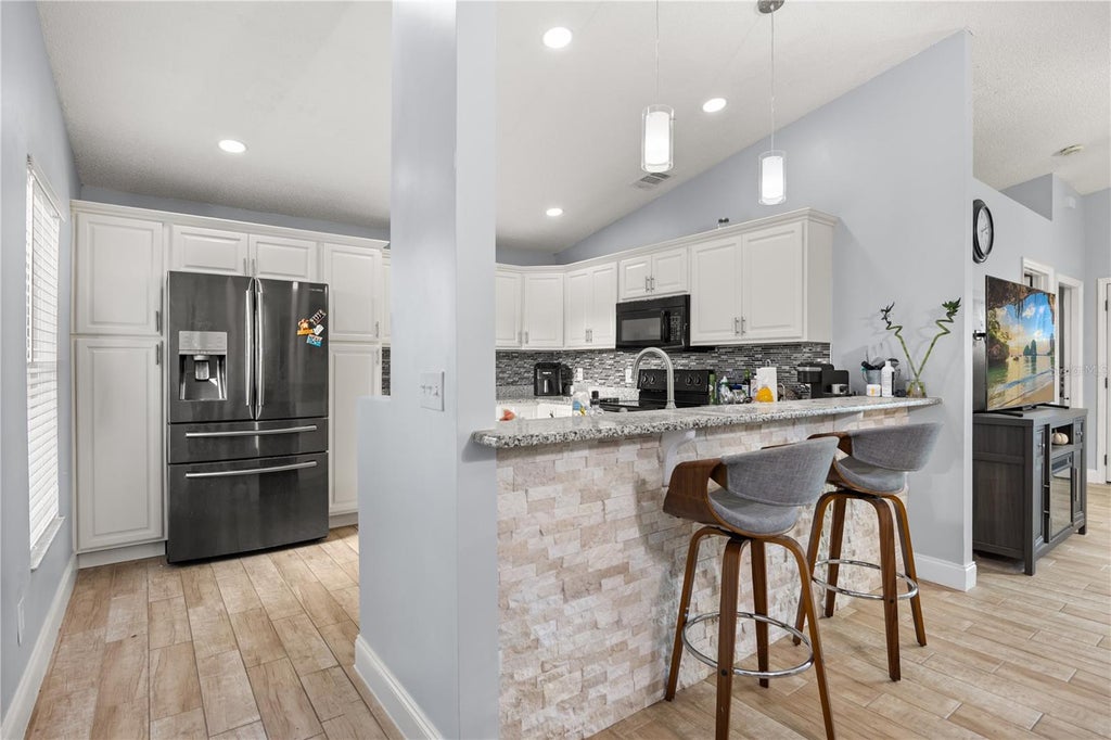 Photo of 2930 Woolridge Drive, Orlando, FL 32837 (MLS # O6449627)