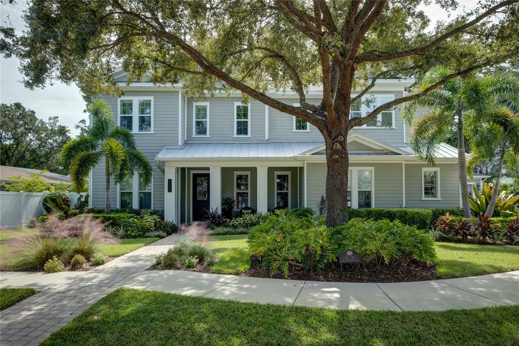 Stunning 5br/4ba custom home on an OVERSIZED 100 X 100 lot in the coveted Virginia Park neighborhood of SOUTH TAMPA. Built in 2016, this 4,108 sq. ft. home epitomizes custom finishes, elegant design, and superior craftsmanship. It has ample living space with large bedrooms, walk-in closets, an office, loft/bonus room, and 10 ft. ceilings on both the 1st and 2nd floors. A centerpiece kitchen and open concept family room features tray ceilings, an oversized island, quartz countertops, stainless steel appliances and high-end lighting. The en-suite bedroom/bathroom on the 1st floor is ideal as a guest room or in-law suite. Rich hardwood floors, decorative cabinetry, bar fridge, butler's pantry and plenty of storage space add to the ambience. Other features include a 3- car garage (2 side load and 1 detached garage), gas appliances, gas tankless water heater and quartz throughout all the bathrooms. The home is located in the highly sought Mabry, Coleman, and Plant School District. Ready to move in? Most of the furniture is for sale under separate contract. Schedule your showing today!