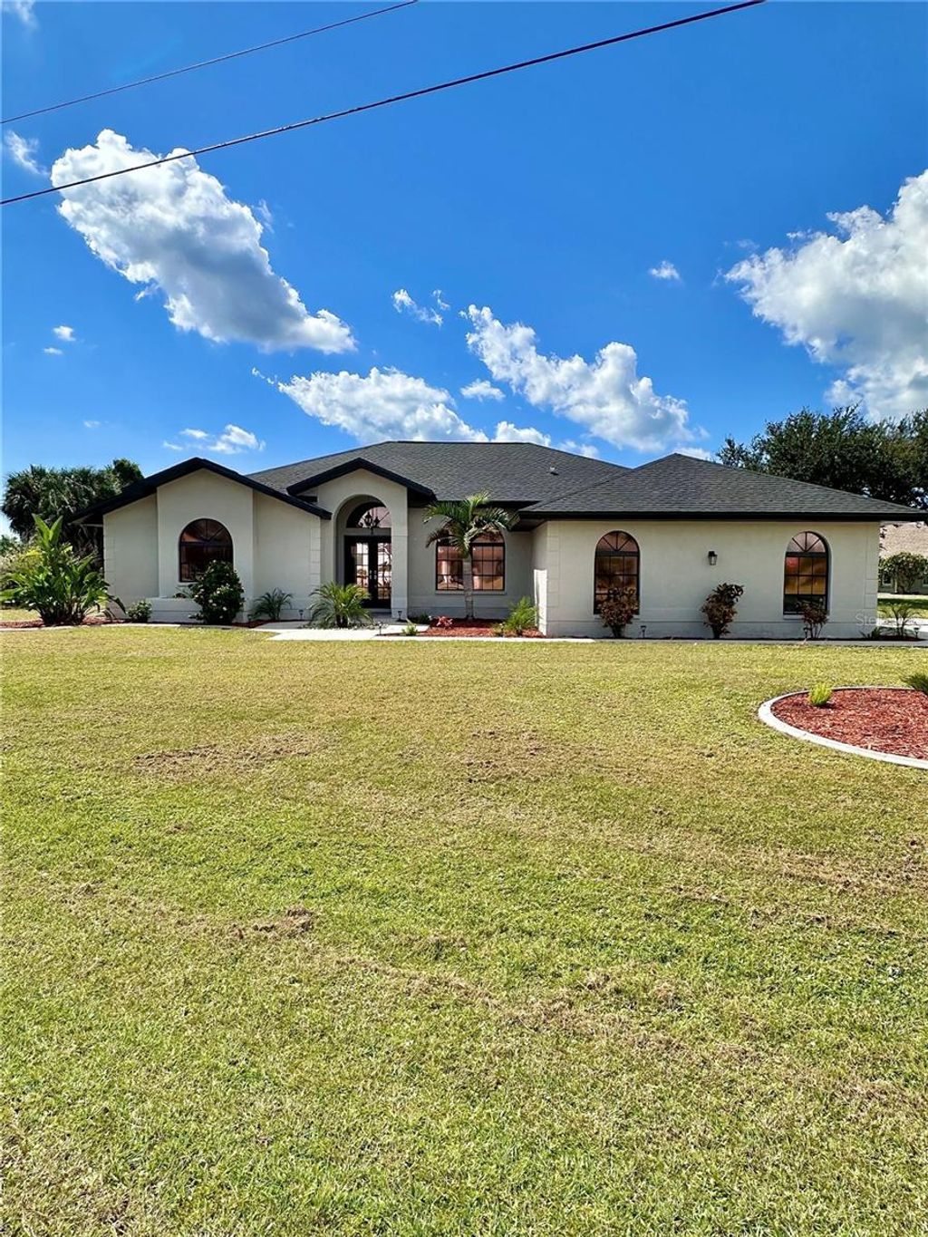 Photo of 1 Clubhouse Road, Rotonda West, FL 33947 (MLS # A4669497)
