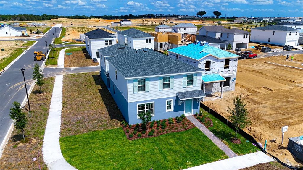Photo of 5643 Enchanted Meadow Alley, Clermont, FL 34714 (MLS # O6404051)