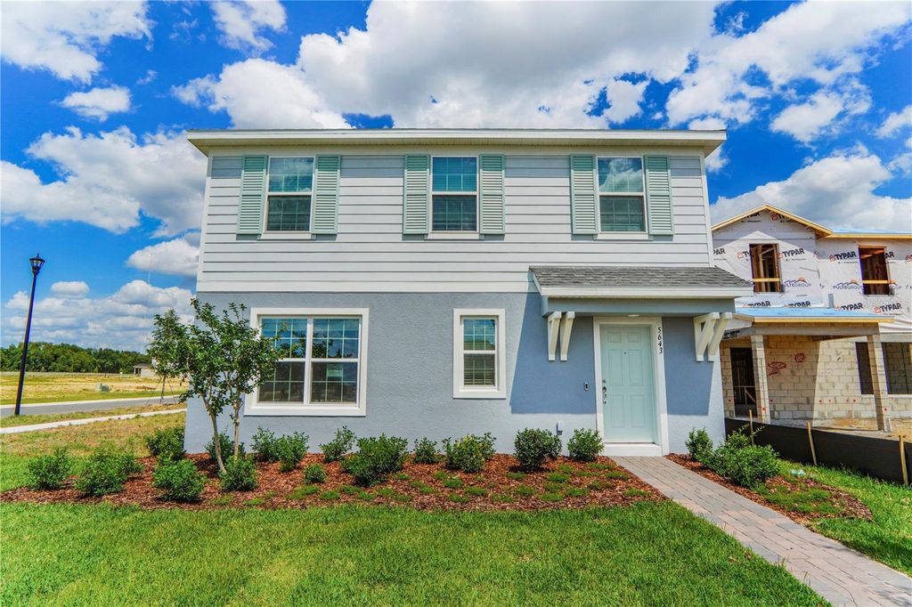 Photo of 5643 Enchanted Meadow Alley, Clermont, FL 34714 (MLS # O6404051)