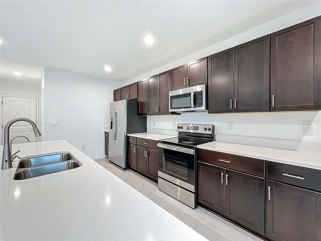 Photo of 5627 Costa Blanca Way, Davenport, FL 33897 (MLS # O6432926)