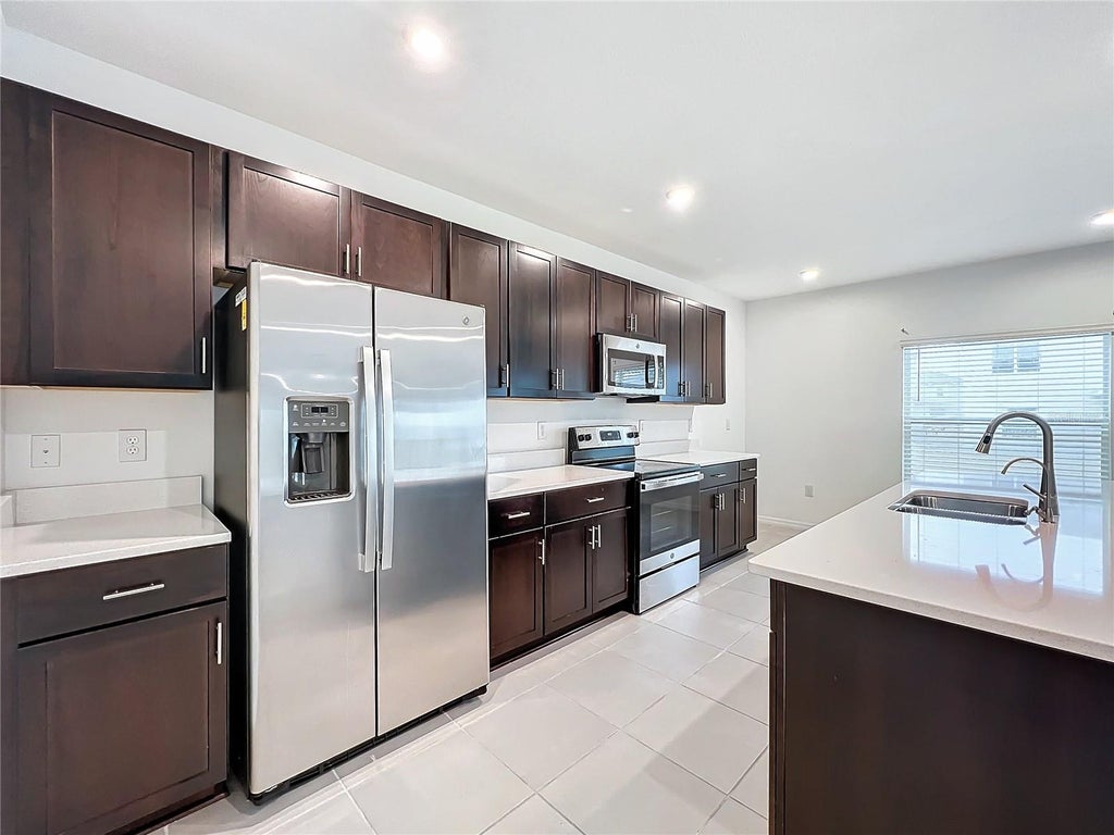 Photo of 5627 Costa Blanca Way, Davenport, FL 33897 (MLS # O6432926)