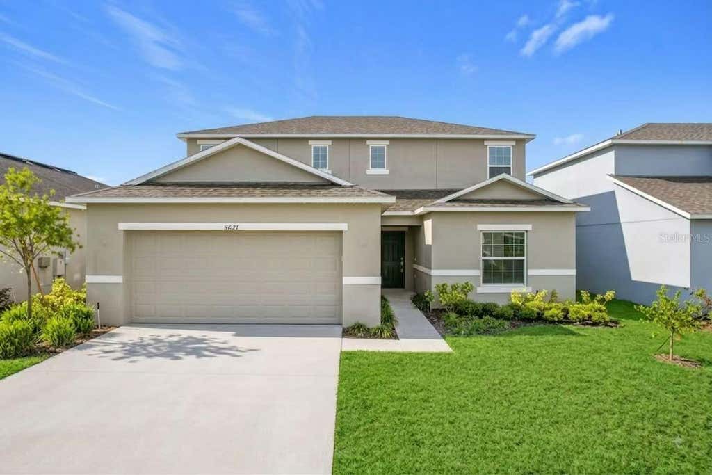 Photo of 5627 Costa Blanca Way, Davenport, FL 33897 (MLS # O6432926)