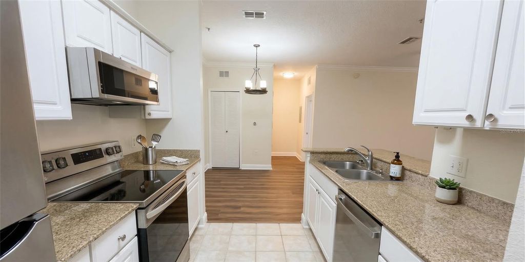 Photo of 430 Southern Pecan Circle #101, Winter Garden, FL 34787 (MLS # O6401124)