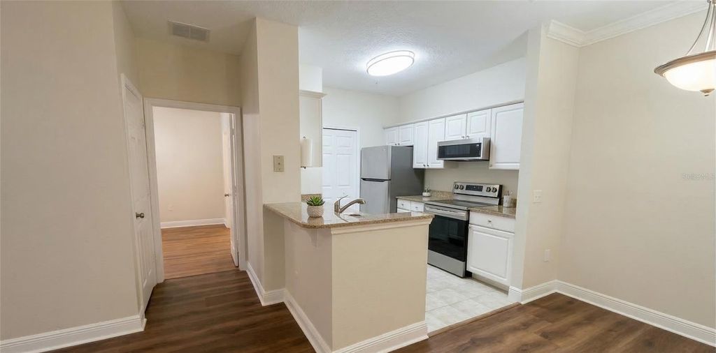 Photo of 430 Southern Pecan Circle #101, Winter Garden, FL 34787 (MLS # O6401124)