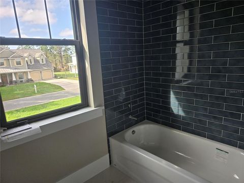 Tiny photo for 405 Long And Winding Road, Howey In The Hills, FL 34737 (MLS # O6245797)