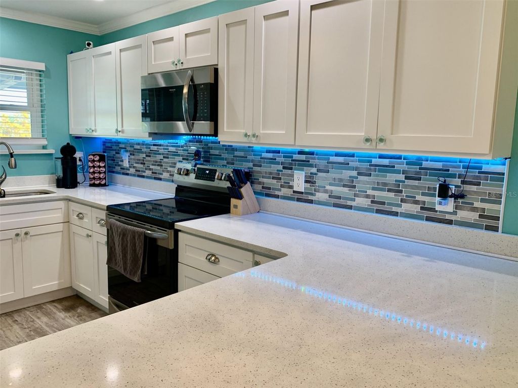 Photo of 4678 Marine Parkway #305, New Port Richey, FL 34652 (MLS # TB8474437)