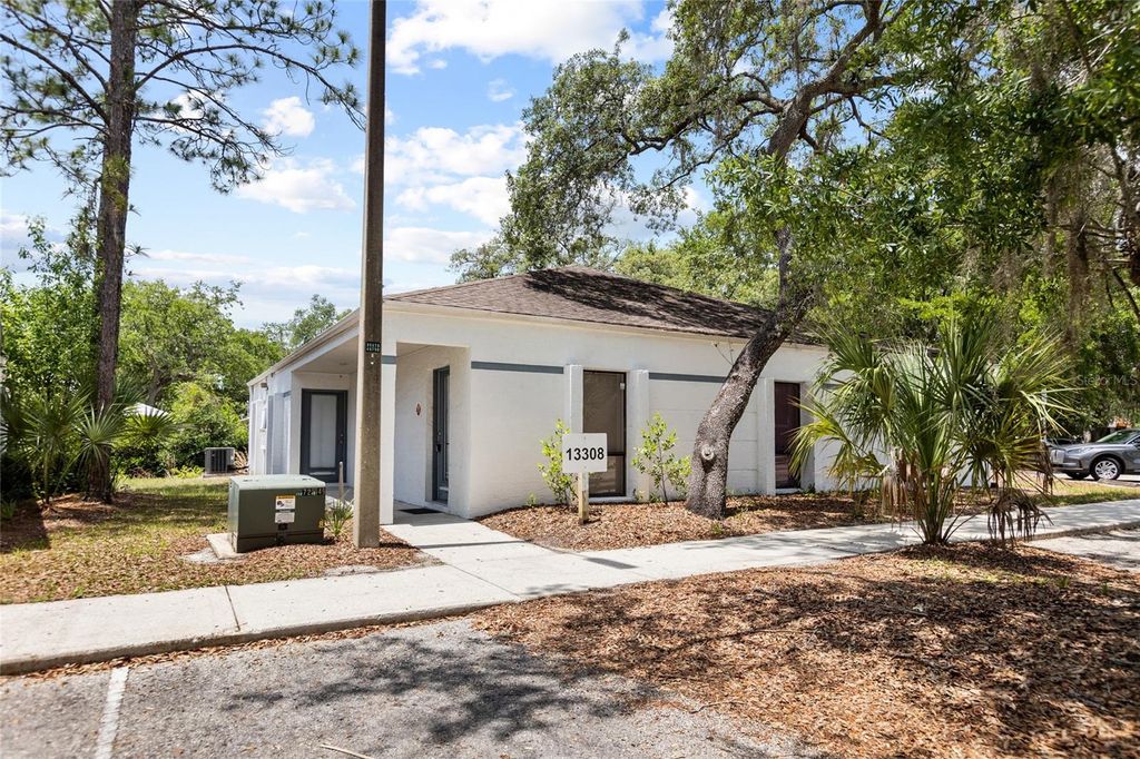 Photo of 13308 Winding Oak Court, Tampa, FL 33612 (MLS # TB8506428)