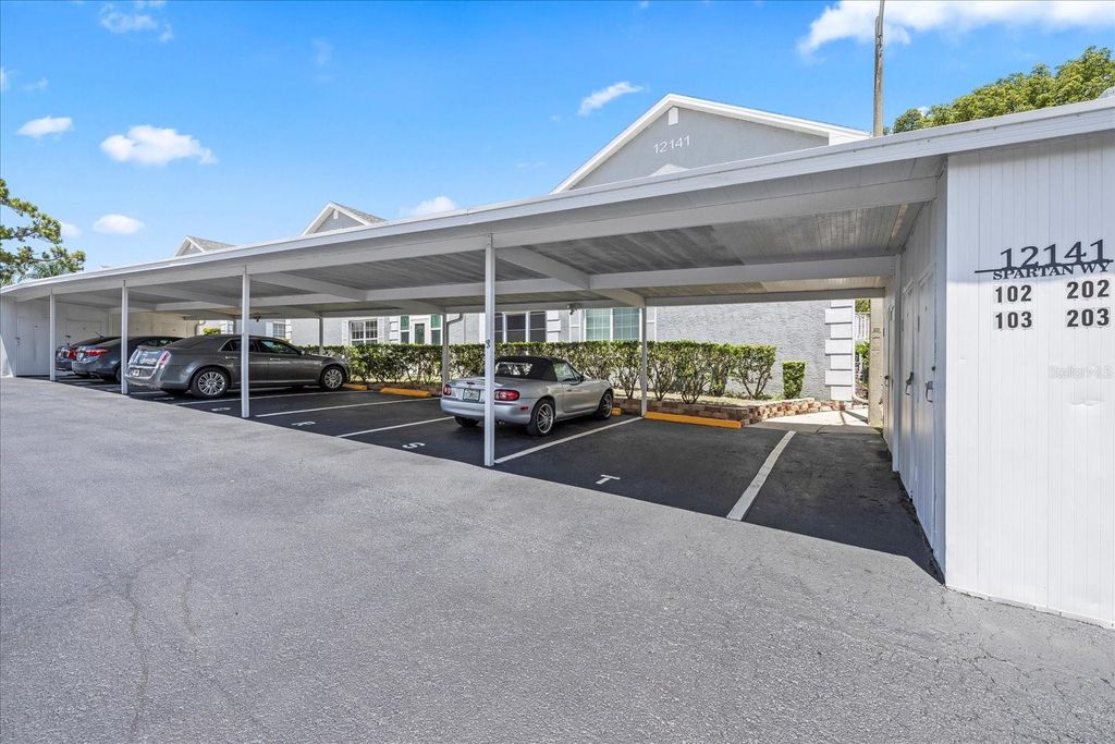 Photo of 12141 Spartan Way #102, Hudson, FL 34667 (MLS # W7876859)