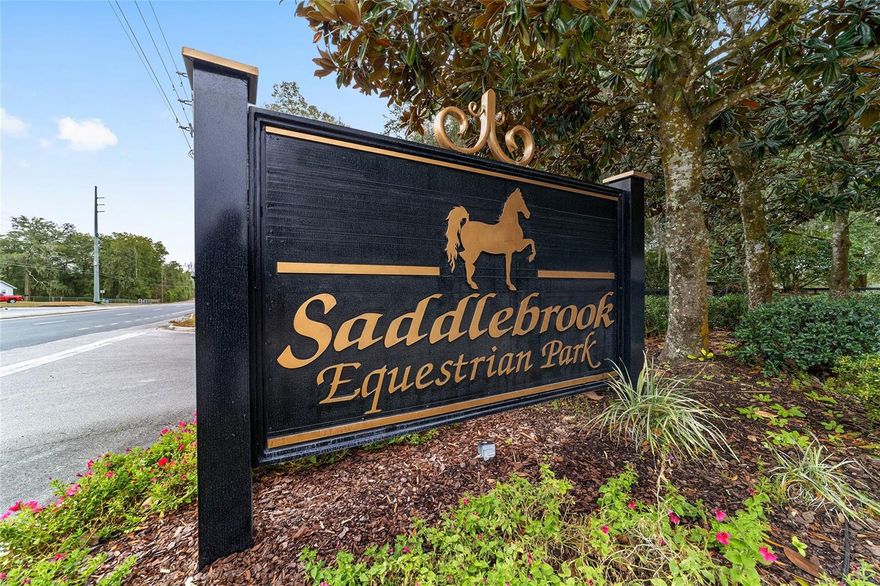 This beautiful 6+ acre farm is located just minutes to WEC, in the gated community of Saddelbrook Equestrian Park. The community provides the perfect place to live your equestrian dream including a beautiful bridle path around the community for endless riding opportunities. This
beautifully updated farm welcomes you with its grand gated entrance and circular driveway. The delightful home was just completely renovated and updated with all new finishes, large format tile throughout the home, new wall of cabinets in the kitchen, walk in pantry and a 14 foot island that can seat 8 with double sided cabinets for tons of storage. Quartz countertops in the kitchen, baths and laundry. New appliances with 48” built in refrigerator, beverage and wine cooler, and induction stove top. Master bath is a true spa experience with a 3 person sauna and large walk in shower with room for 2 shower heads and floor to ceiling shower glass walls. Master bedroom has 2 large walk in closets and all 4 bedroom closets have new built in shelving and storage. New washer and dryer in the laundry room with full built in utility cabinets. Plantation shutters and solid wood 3 panel doors throughout. You will fall in love with the light and bright, open floorplan. The home also has a separate office/den space and lovely screened patio overlooking the farm landscape. Your horses will also enjoy all of the comforts of the 7 stall center-aisle barn features auto water in each stall, fly spray system, tack and feed rooms, and also provides a covered area for equipment storage. The farm also features a second 2 stall barn complete with a nice tack room and oversized stalls. The acreage is fenced and currently has 4 large paddocks with plenty of room to add an arena if desired. Don’t miss this one of a kind property and experience the Florida horse lifestyle!