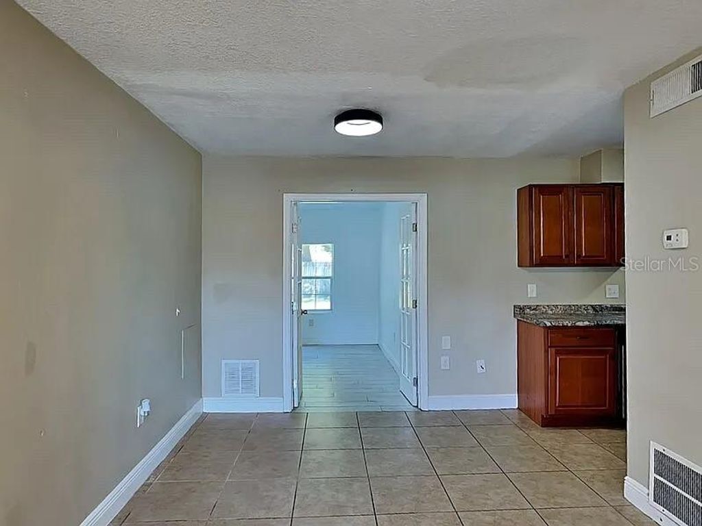 Photo of 1117 Princewood Drive, Orlando, FL 32810 (MLS # V4948222)