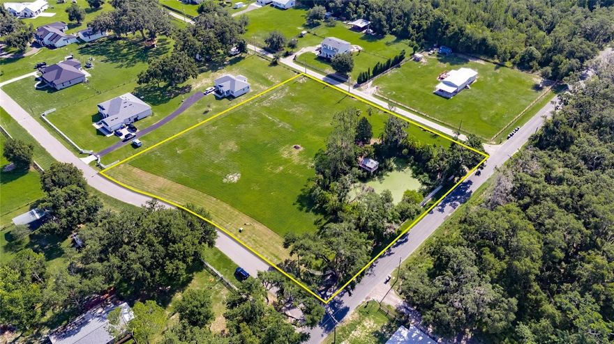 Create your custom dream home on this picturesque 2.37-acre lot in Plant City. This unique property features a private pond and charming boathouse—offering a peaceful, scenic backdrop perfect for relaxing or entertaining. A rare opportunity to enjoy the serenity of nature while still being conveniently located near town amenities.
