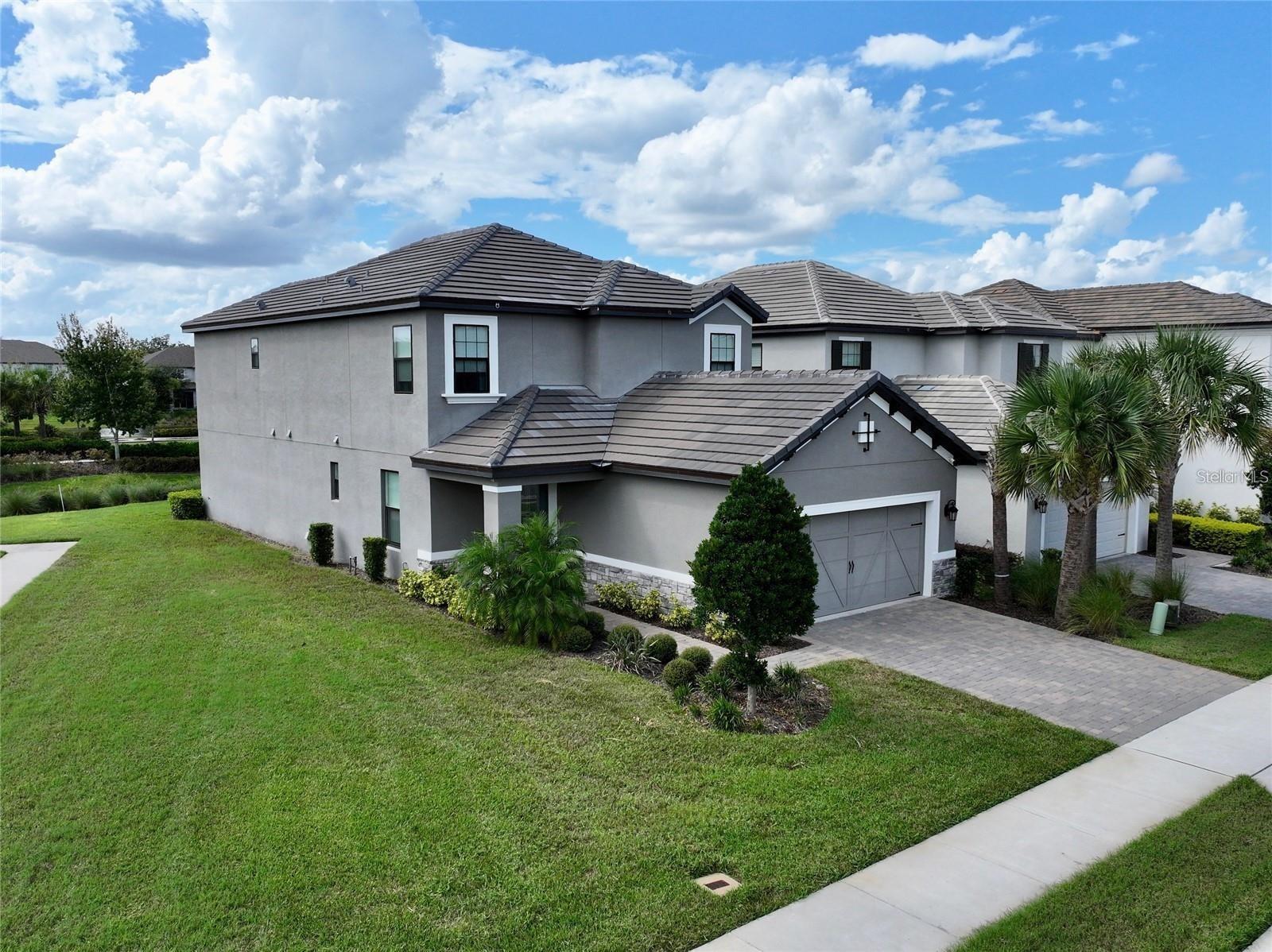 Available December 1st, 2025 - Distinctive, private, unique and full of character is what sets this estate apart from all other properties on the market. Welcome home to your freshly built and highly updated Anastasia plan in the fabulous newer Winter Park community of Hawk's Crest. Located only minutes from the iconic and historic Winter Park Avenue with plentiful shopping, amazing venues, epic events, dining and zoned for all excellent rated schools, this estate is ideally located for everything Orlando. Arriving at the property you will know when to stop the car due the large corner and water view lot - you will immediately know that this is your new home! Walking through the gorgeous glass insert front door, you will embraced by modern and fresh selections and improvements throughout the home - all handpicked by the particular landlord. These included wood vinyl plank throughout the entire first floor of the home, gourmet kitchen with quartz counter tops, new stainless steel appliances, white subway backsplash, updated stainless farm sink, 42 inch cabinets with pewter finishes, second level ensuite, second level wrapped iron spindles, upgraded baseboards blinds on every light kissed window. The home is incredibly well laid out with the masterful kitchen being the heart and center point of the home, the first master suite, den, 1/2 bath, and laundry room all on the first floor. Ascend the gorgeous stairs to the second floor which contains the ensuite bedroom, shared bathroom with double vanities and the 3rd and 4th bedrooms. Escape with your friends and family to the serene water view backyard with a picture framed view of the lake fountain! This home is truly a special find located in the Hawk's Crest community, a community which boast access to a state of the art club house with pool, splash pad and spa - venture further and you will find a dog park, playground and even a boat dock with canoe/paddle board access to Lake Howell! This is your home - grab it while it last - Welcome to Winter Park - your slice of Florida Life!