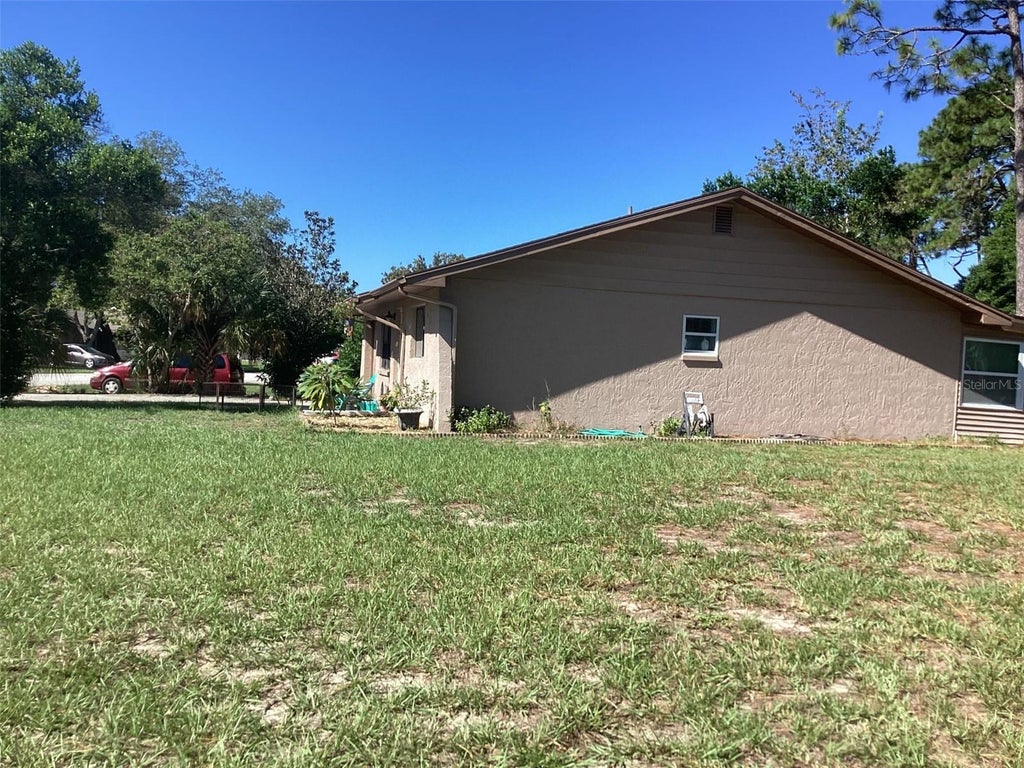 Photo of 8445 Dunnellon Road, Weeki Wachee, FL 34613 (MLS # O6448856)