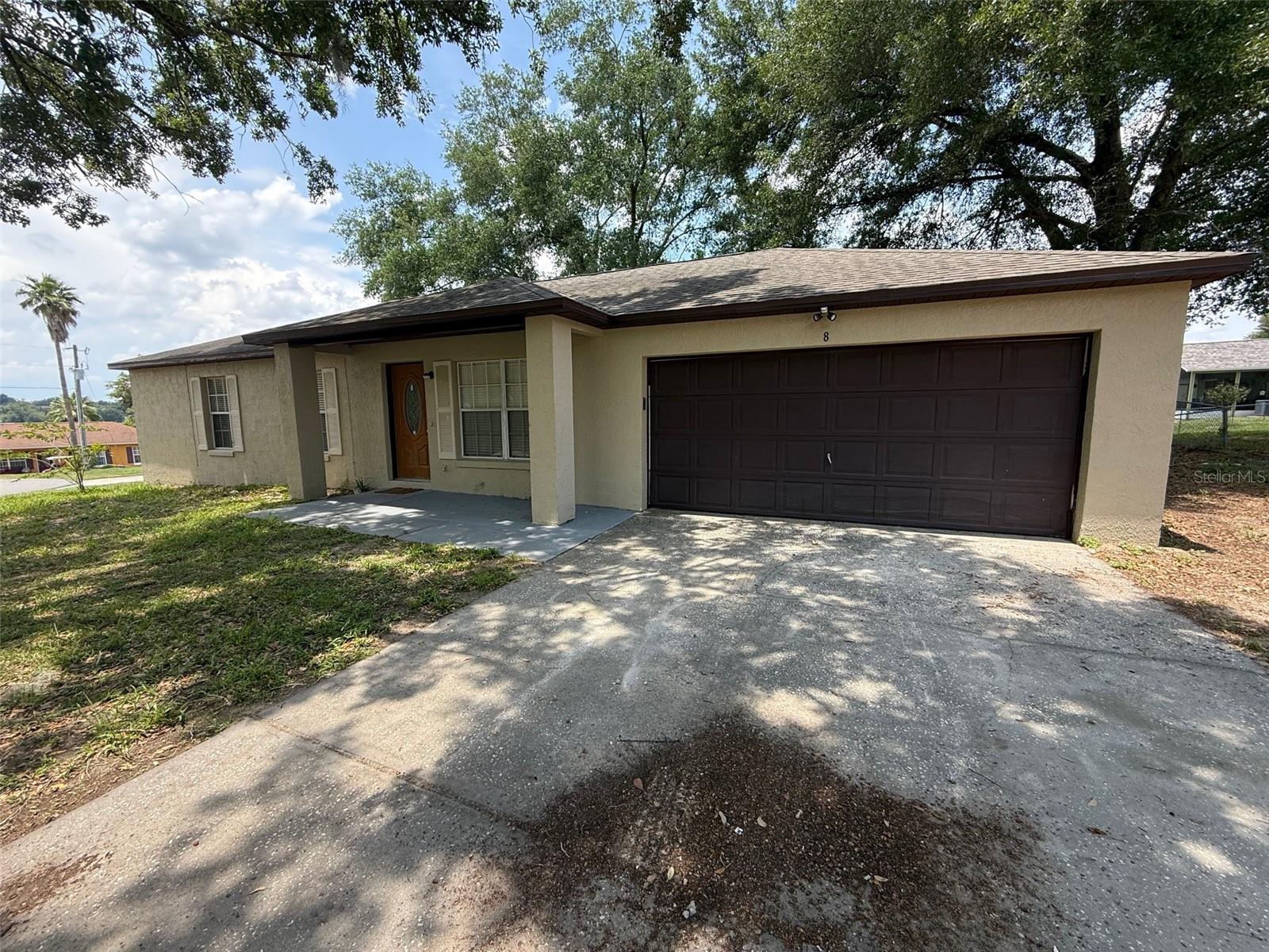 Welcome to 8 Berry Dr, a delightful 3-bedroom, 2-bathroom home nestled in the serene community of Lake Jackson Estates in Mascotte, FL. Situated just west of Clermont, this home offers convenient access to local amenities, scenic parks, and major roadways for easy commuting.
Step inside to discover an inviting open floor plan with soaring cathedral ceilings, creating a bright and airy atmosphere. The modern kitchen boasts stylish updated cabinets and countertops, complemented by sleek appliances for effortless meal prep. Throughout the home, you'll find brand-new carpet in the living areas and freshly updated tile in the dining and wet spaces, adding a touch of contemporary charm.
Fresh interior paint enhances the home's vibrant appeal, while the spacious two-car garage provides ample storage and parking convenience. Sitting on a generous lot, this property offers plenty of outdoor space for relaxation, entertaining, or creating your own personal retreat.
Don't miss this wonderful opportunity—make 8 Berry Dr your new home today! Contact Florida Rental Team to schedule a private showing.
