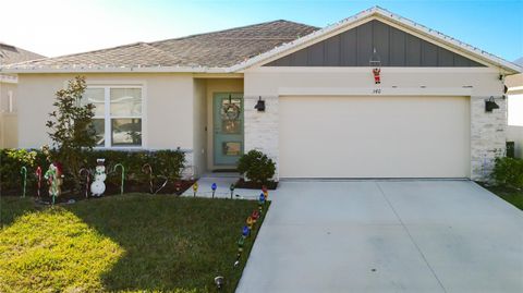 Photo of 348 Talisi Loop, Saint Cloud, FL 34771 (MLS # O6369195)