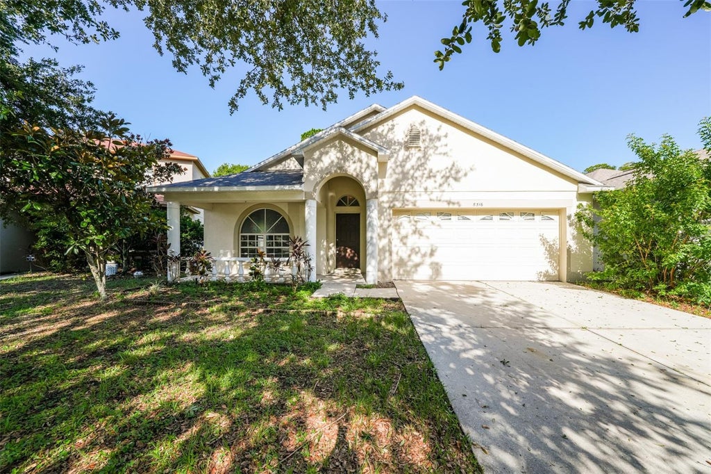 Photo of 8516 Canterbury Lake Boulevard, Tampa, FL 33619 (MLS # O6437413)