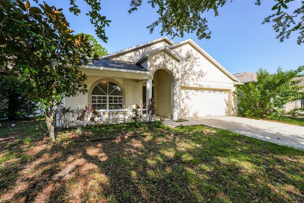 Photo of 8516 Canterbury Lake Boulevard, Tampa, FL 33619 (MLS # O6437413)