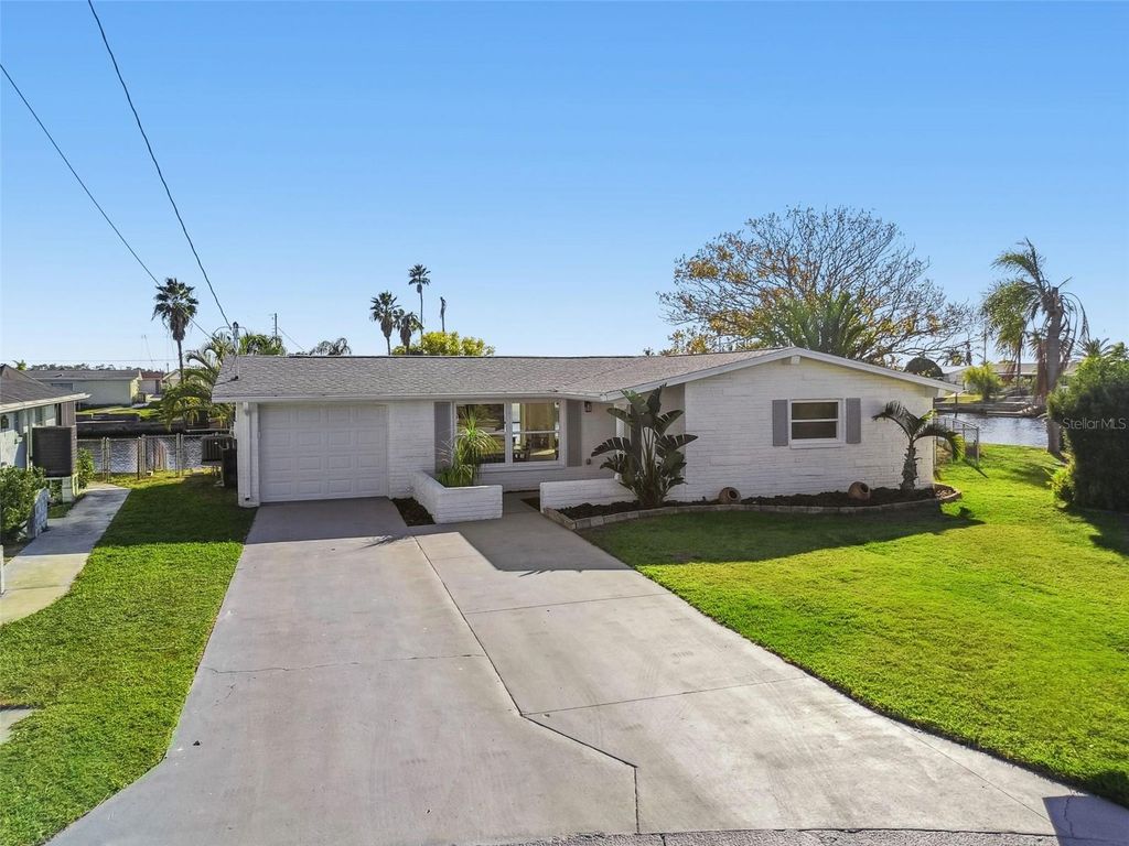 Photo of 12605 4th Isle, Hudson, FL 34667 (MLS # TB8450215)