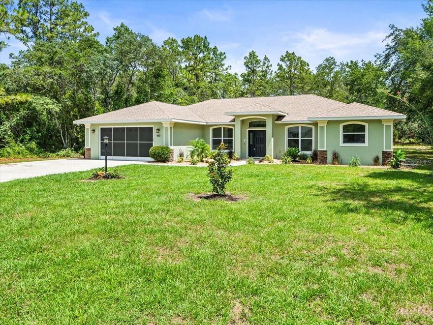 This 4 Bedroom, 3 Full Bathroom Pool Split Floor Plan Home
with High-End Upgrades on a half-acre lot offers 2,724 sq ft of living space. Built in 2008 and
recently renovated throughout, this home combines solid construction with luxury finishes.
Step into a fully updated kitchen and baths featuring quartz countertops, new vinyl flooring
throughout, freshly painted interior and new lighting including fans. The kitchen inspires you to
become the party host by providing you plenty of room with all brand-new appliances including
oven/microwave combo, cooktop, hood, fridge, and dishwasher. Luxury is awaiting its new
owner as the primary suite that includes a 12&#39; double rainfall walk-in shower with doorless
entry a true spa-like retreat. The other two baths were given the same quality of upgrades
featuring tiled showers, quartz countertops, and new toilets with updated cabinetry. Additional
amenities are gas powered Generac generator, Bluetooth-enabled intercom system, fresh
landscaping and painted garage and lanai. The new lanai ceiling fans within the screened-in
pool enclosure provides you with privacy to enjoy your Florida oasis. This move-in-ready home
offers comfort, style, and peace of mind in a desirable location.